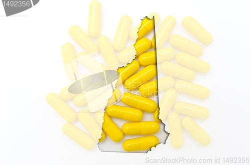 Image of Outline map of new hampshire with transparent pills in the backg