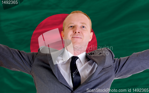 Image of happy businessman because of profitable investment in bangladesh