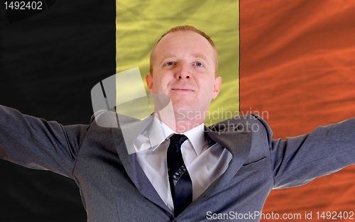 Image of happy businessman because of profitable investment in belgium st