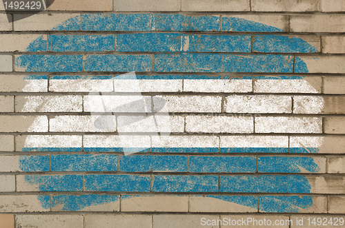 Image of flag of el salvador on grunge brick wall painted with chalk  