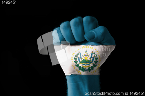 Image of Fist painted in colors of el salvador flag