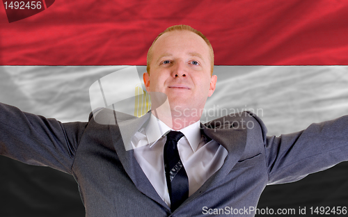 Image of happy businessman because of profitable investment in egypt stan