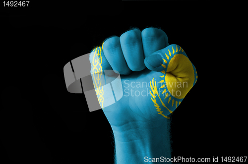 Image of Fist painted in colors of kazakstan flag