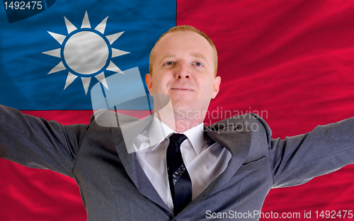 Image of happy businessman because of profitable investment in taiwan sta