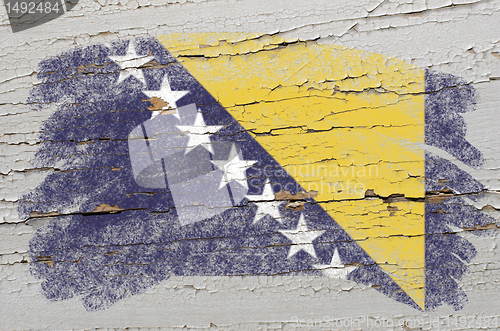 Image of flag of bosnia and herzegovina on grunge wooden texture painted 