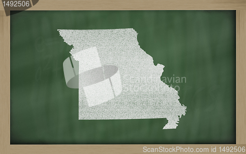 Image of outline map of missouri on blackboard 