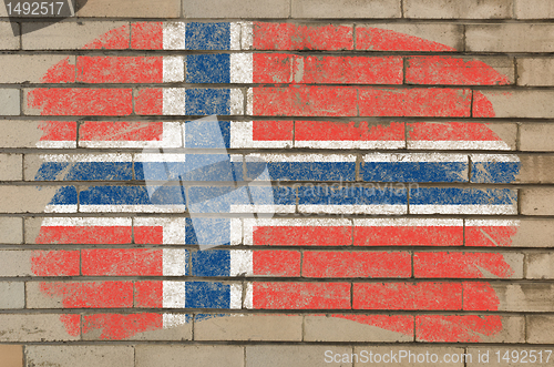 Image of flag of norway on grunge brick wall painted with chalk  