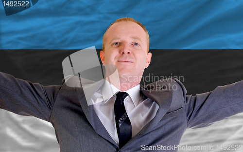 Image of happy businessman because of profitable investment in estonia st