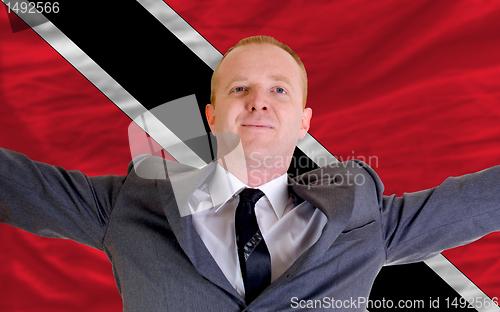 Image of happy businessman because of profitable investment in trinidad t