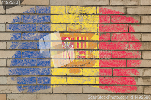 Image of flag of andora on grunge brick wall painted with chalk  
