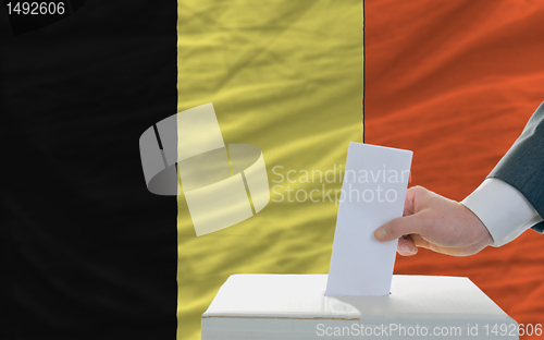 Image of man voting on elections in belgium