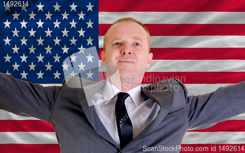 Image of happy businessman because of profitable investment in america st