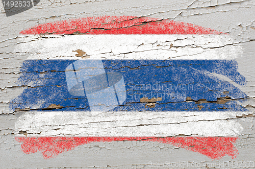 Image of flag of Thailand on grunge wooden texture painted with chalk  