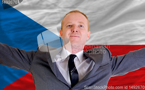 Image of happy businessman because of profitable investment in czech stan