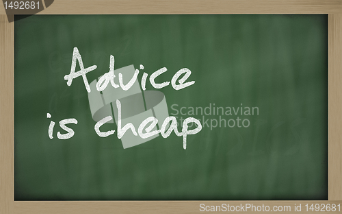 Image of " Advice is cheap " written on a blackboard