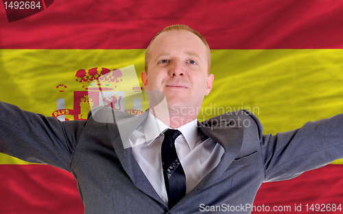 Image of happy businessman because of profitable investment in spain stan