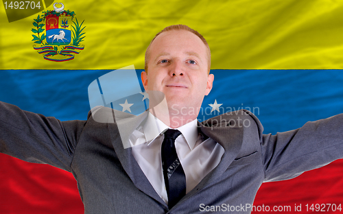 Image of happy businessman because of profitable investment in venezuela 