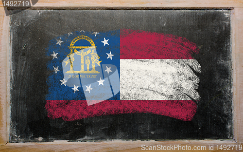 Image of flag of Georgia on blackboard painted with chalk  