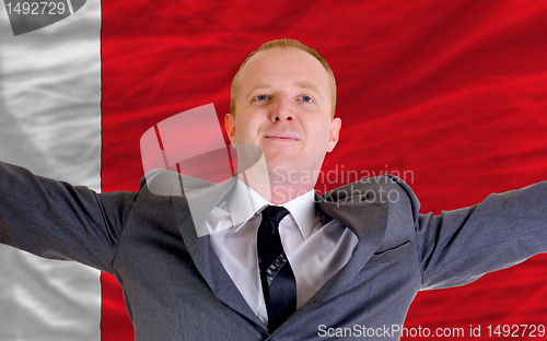 Image of happy businessman because of profitable investment in bahrain