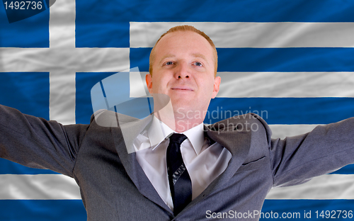 Image of happy businessman because of profitable investment in greece sta