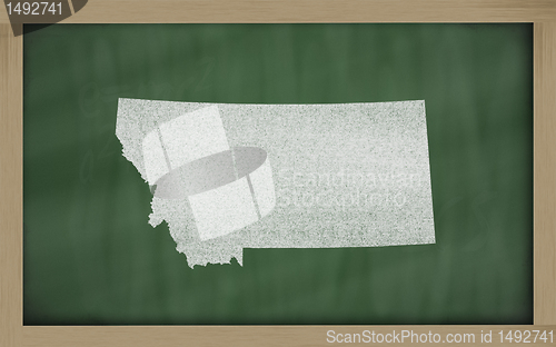 Image of outline map of montana on blackboard 