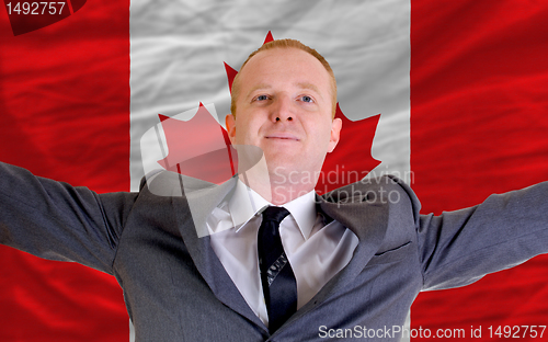 Image of happy businessman because of profitable investment in canada sta