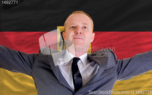 Image of happy businessman because of profitable investment in germany st