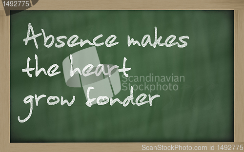 Image of " Absence makes the heart grow fonder " written on a blackboard