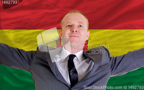 Image of happy businessman because of profitable investment in bolivia st