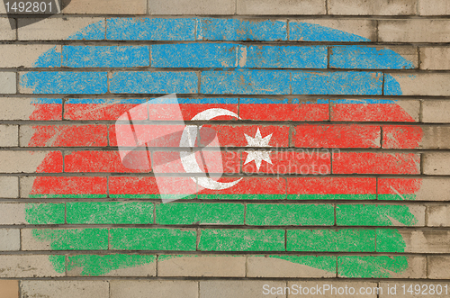 Image of flag of azerbaijan on grunge brick wall painted with chalk  