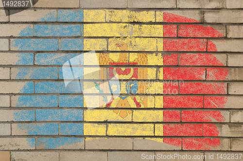 Image of flag of moldova on grunge brick wall painted with chalk  