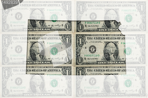 Image of Outline map of Kansas with transparent american dollar banknotes