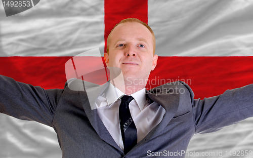 Image of happy businessman because of profitable investment in england st