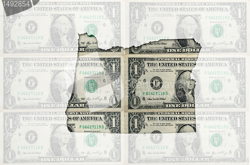 Image of Outline map of oregon with transparent american dollar banknotes