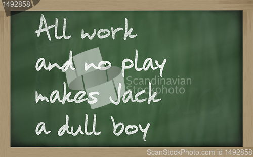 Image of " All work and no play makes Jack a dull boy " written on a blac