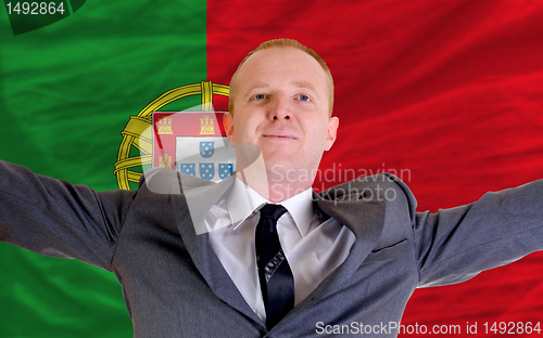 Image of happy businessman because of profitable investment in portugal s