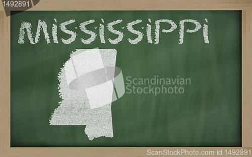 Image of outline map of missouri on blackboard 