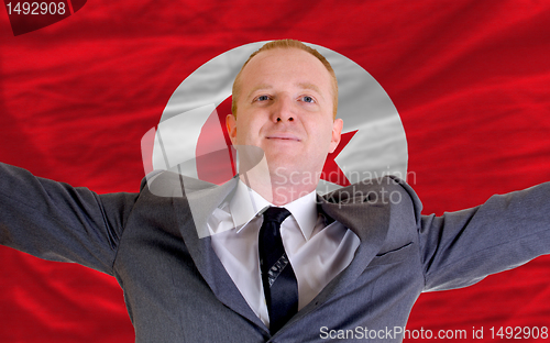 Image of happy businessman because of profitable investment in tunisia st