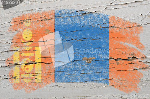 Image of flag of mongolia on grunge wooden texture painted with chalk  