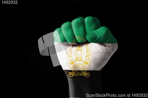 Image of Fist painted in colors of aghanistan flag