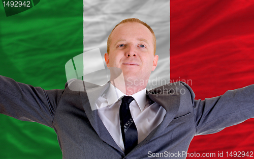 Image of happy businessman because of profitable investment in italy stan