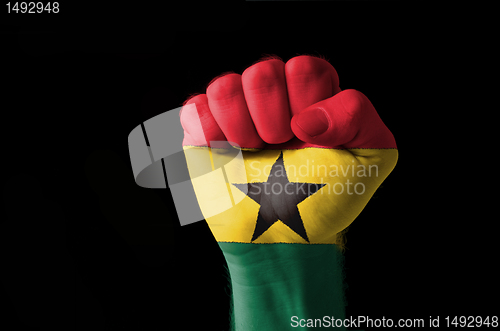 Image of Fist painted in colors of great ghana flag