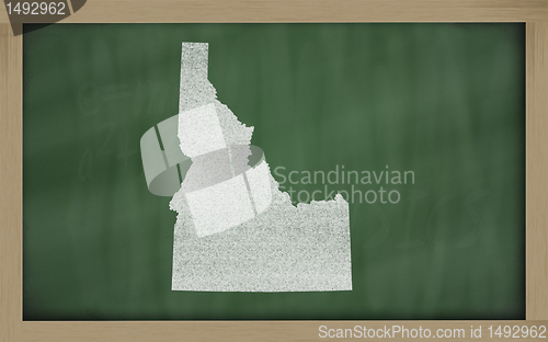 Image of outline map of idaho on blackboard 
