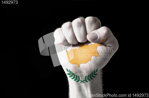 Image of Fist painted in colors of cyprus flag