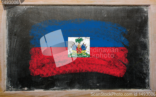 Image of flag of Haiti on blackboard painted with chalk  