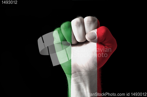 Image of Fist painted in colors of italy flag