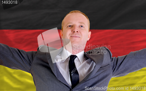 Image of happy businessman because of profitable investment in germany st