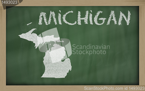 Image of outline map of michigan on blackboard 