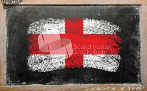 Image of flag of england on blackboard painted with chalk  
