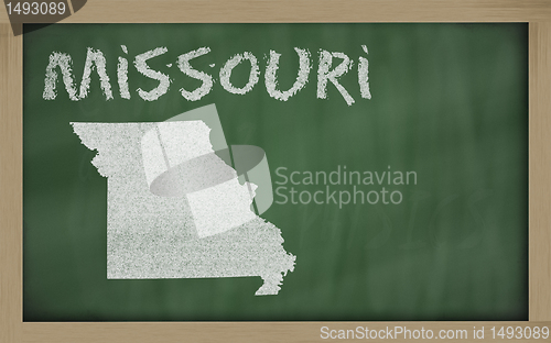 Image of outline map of missouri on blackboard 